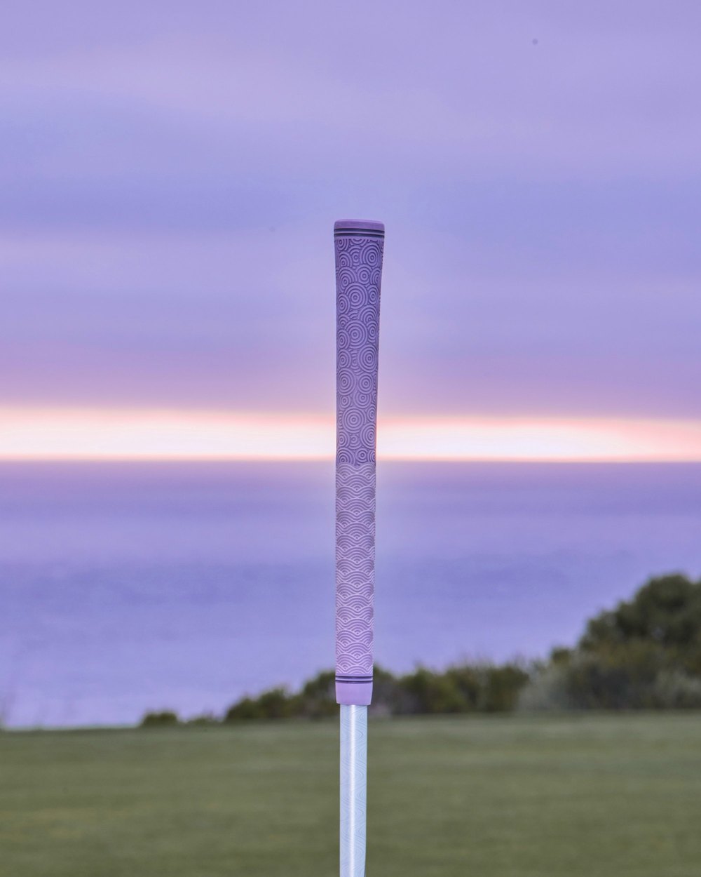 Cloud & Wind campaign image: Against a coastal sunset