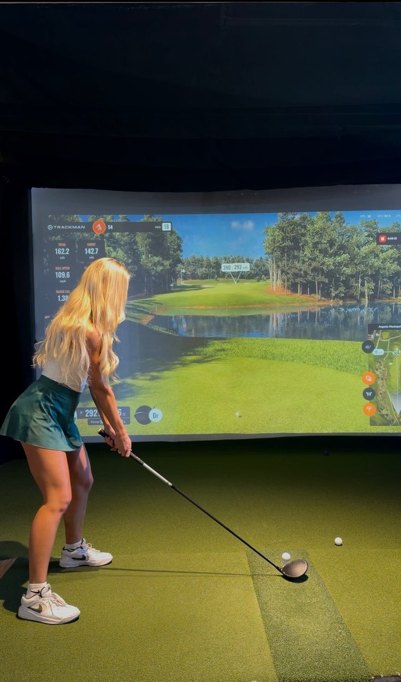 A TrackMan unit set up in a bay at ROK Golf