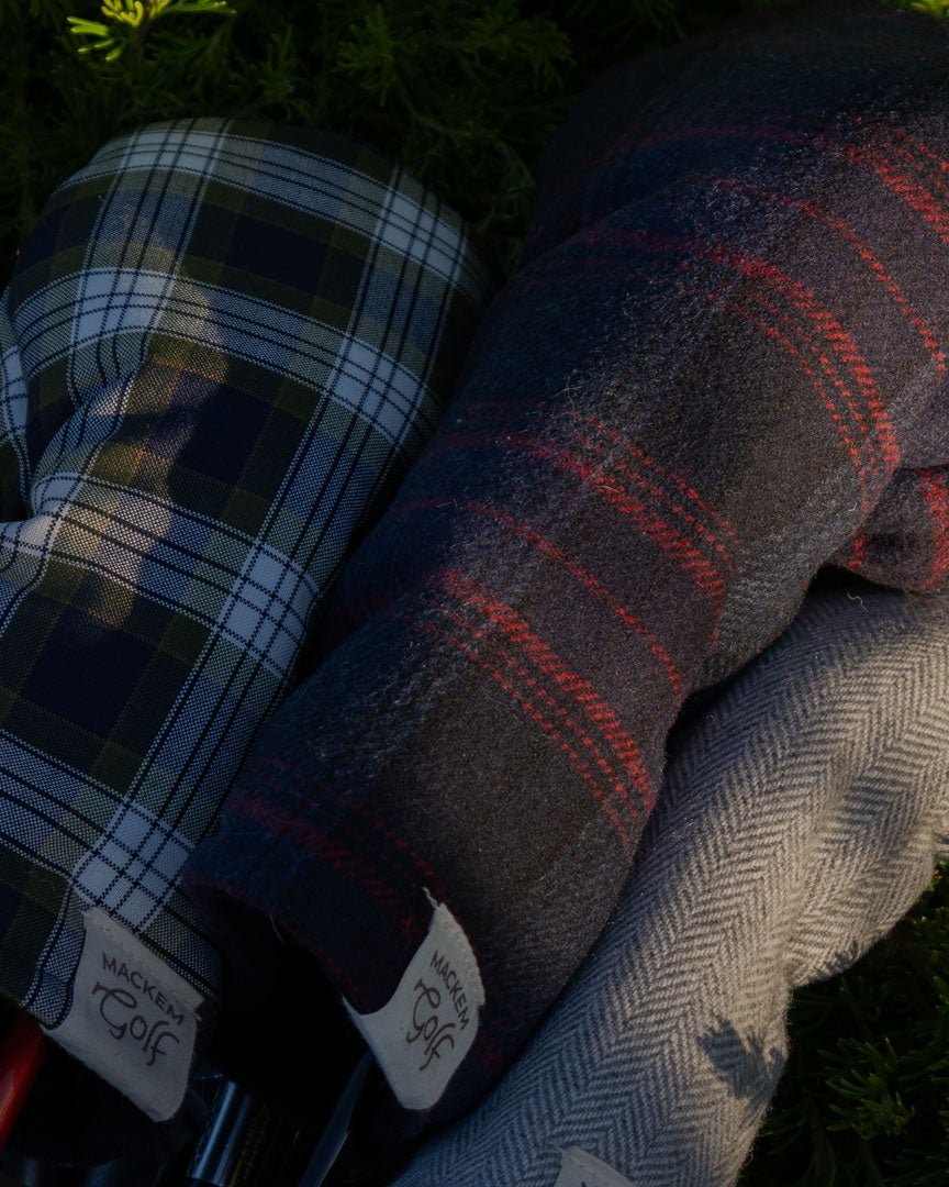 Plaid wool Mackem headcovers on the grass