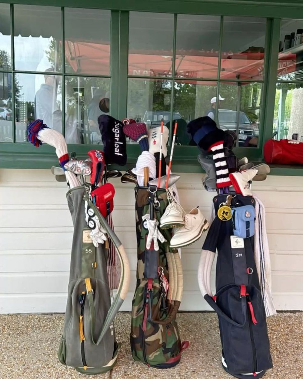 Sugarloaf Social Club photograph: Sugarloaf Social Club bags at the clubhouse window