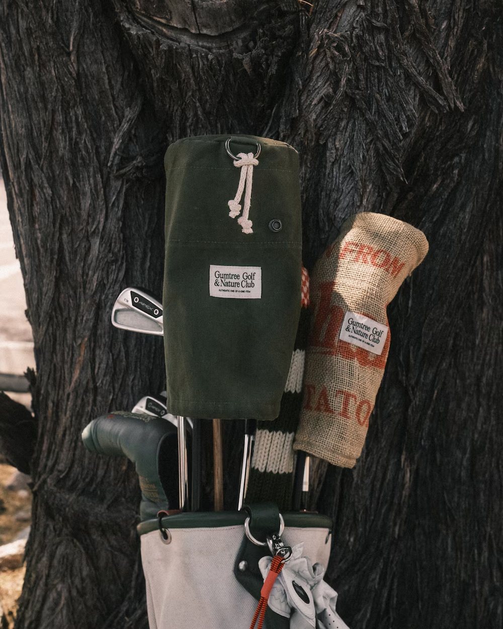 Gumtree Golf & Nature Club photograph: Gumtree Golf & Nature Club headcovers on a canvas bag against a tree