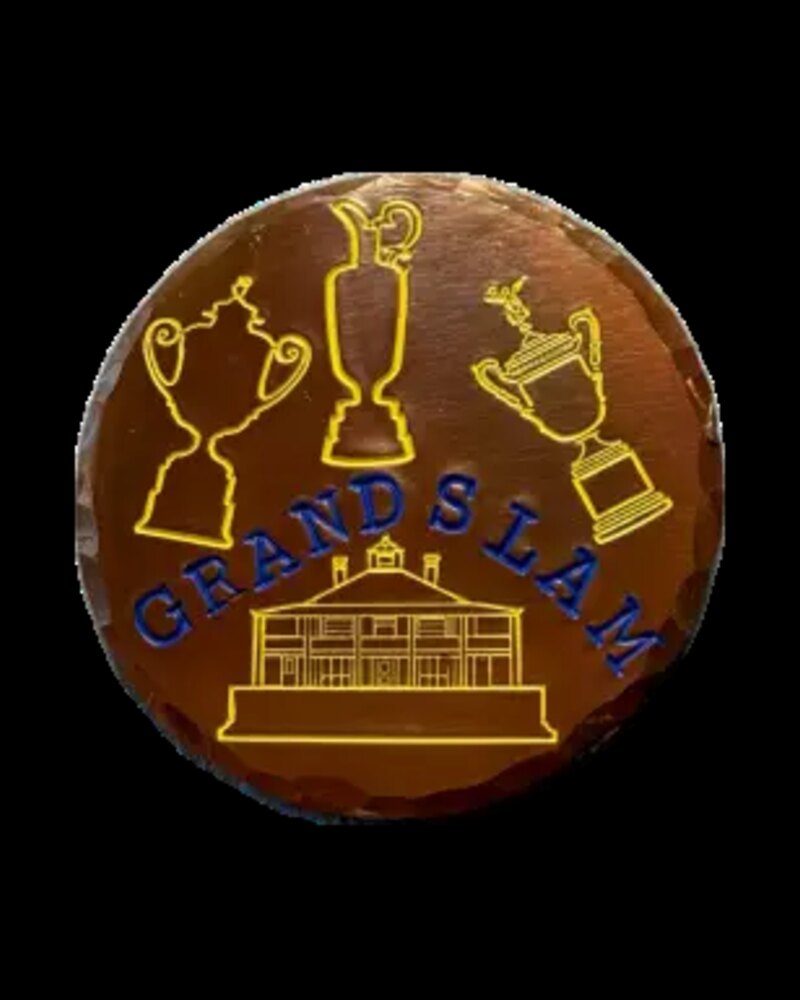Golf Life Metals torched copper marker replicating Rory McIlroy's 2026 Masters winning marker