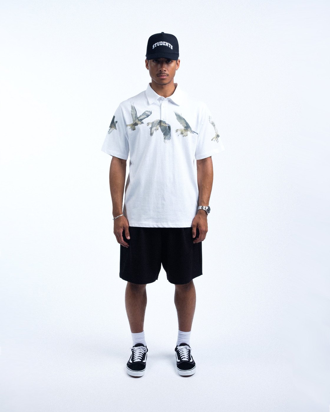 Students Golf Mapleton polo with flying bird graphic across the shoulders · view 1 of 4