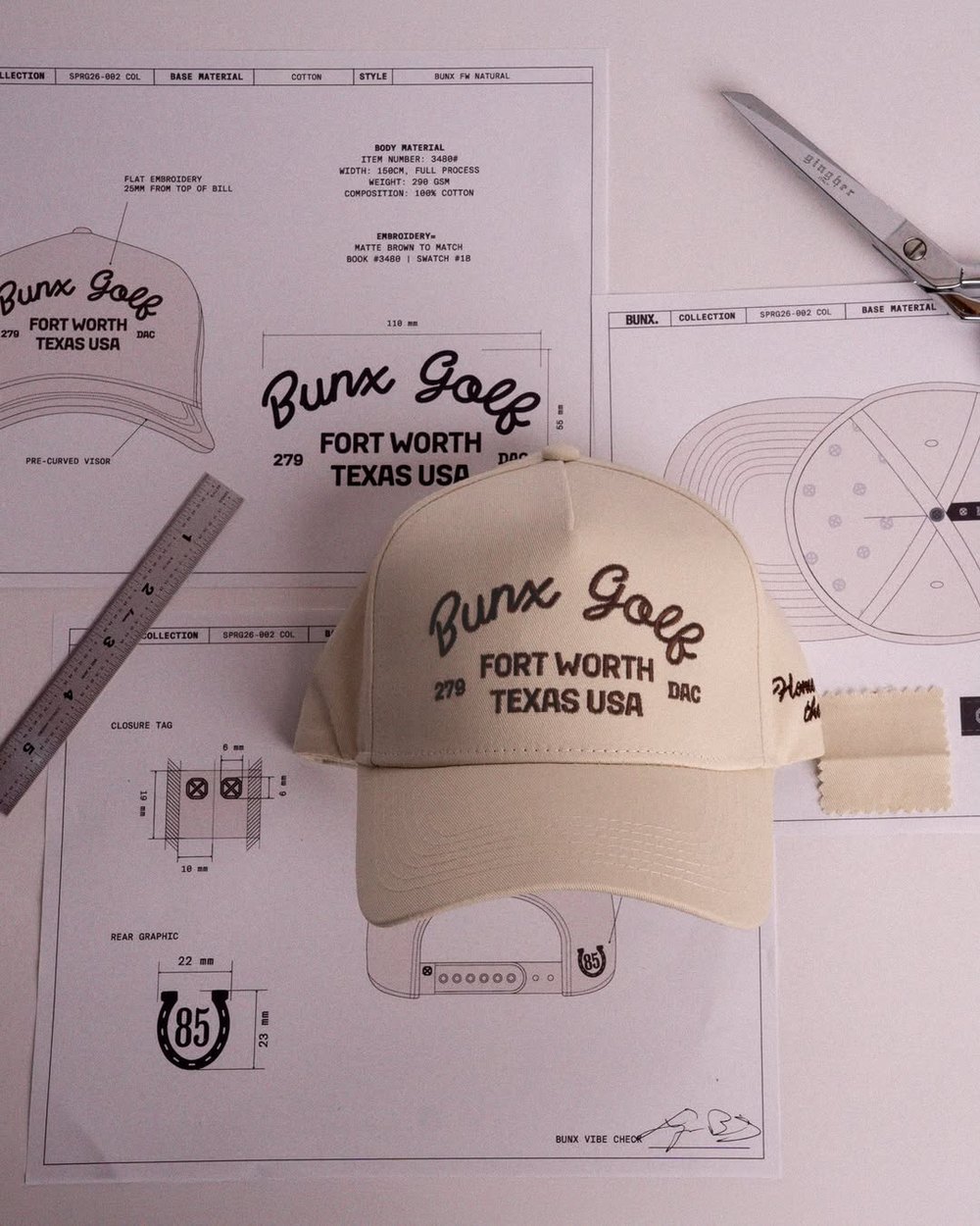 The Fort Worth hat lying on its technical drawings