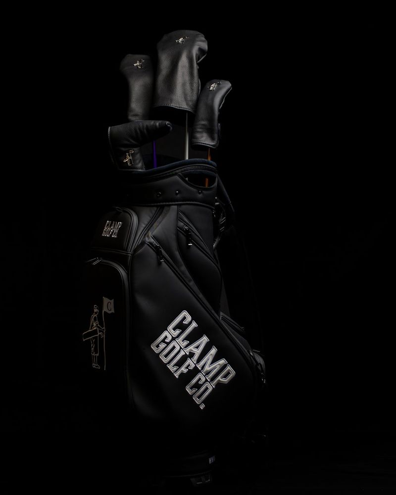 Black Clamp covers in a black golf bag