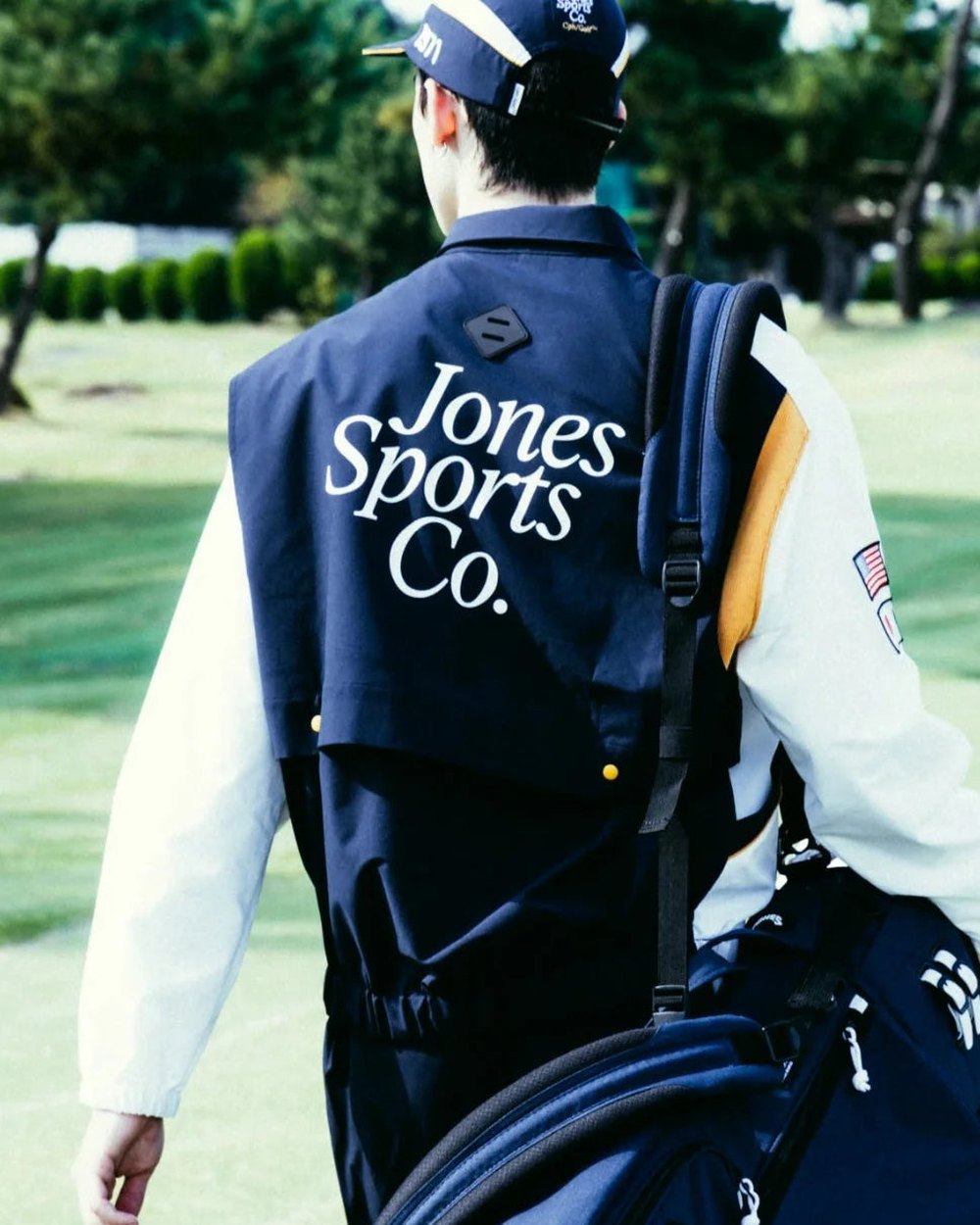 The back of a Jones x Cph/Golf jacket reading Jones Sports Co.
