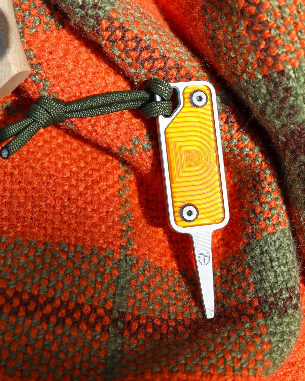 Dimple & Divot Every Round Carry Divot Tool In The Woods · view 1 of 5