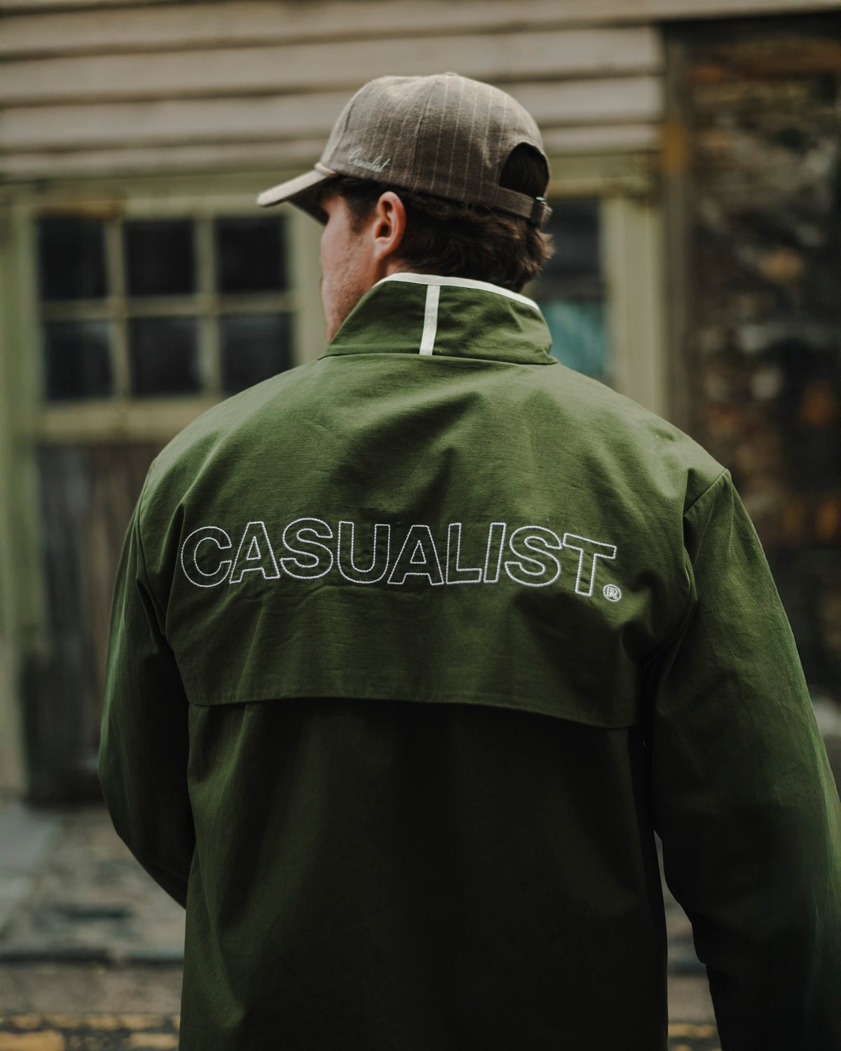 The back of a Casualist olive ripstop jacket