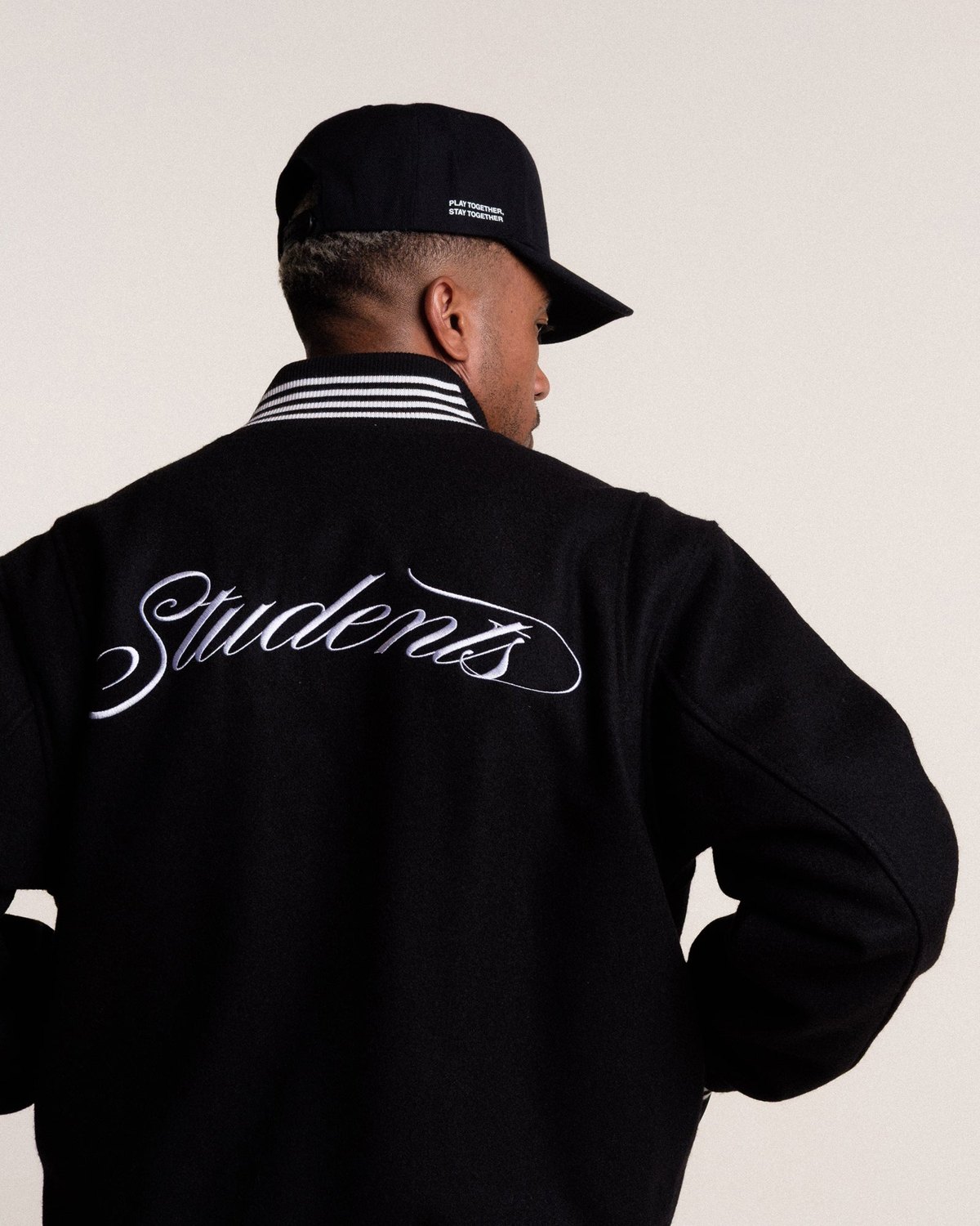 The back of the Denali stadium jacket with Students script embroidery
