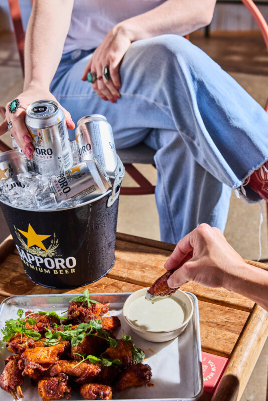 Loro Austin — cold beer and smoked wings on the patio