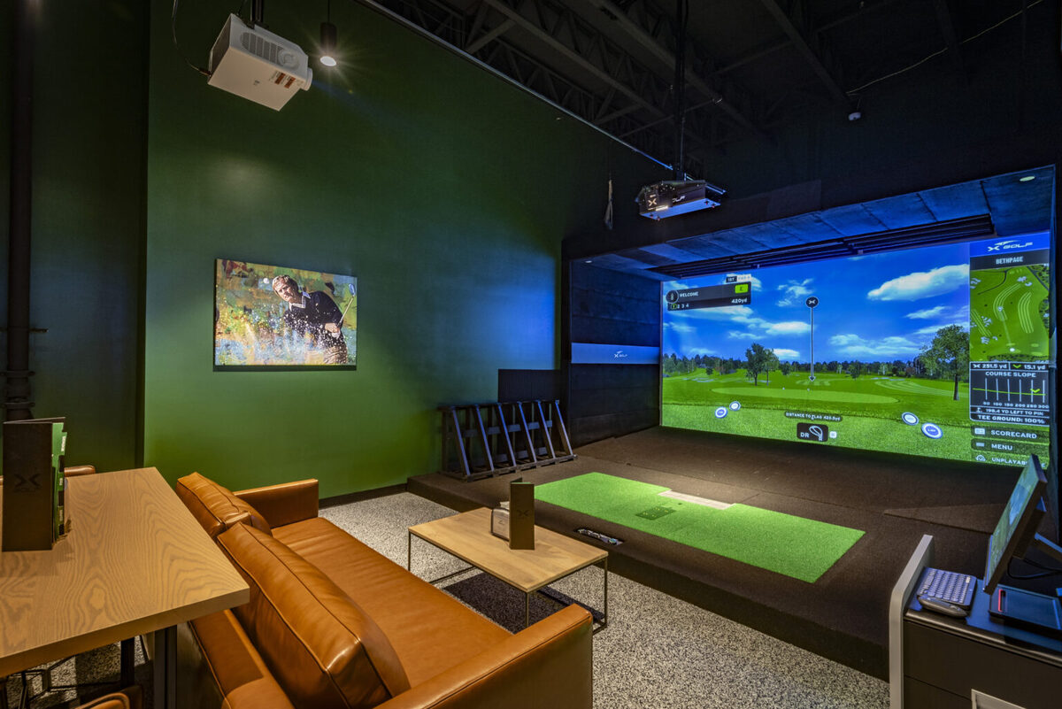 X-Golf Cedar Park — private simulator bay with lounge seating