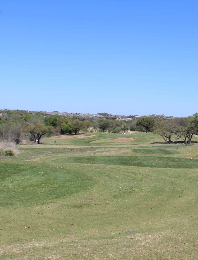 Avery Ranch Golf Club — limestone ravine and live oaks