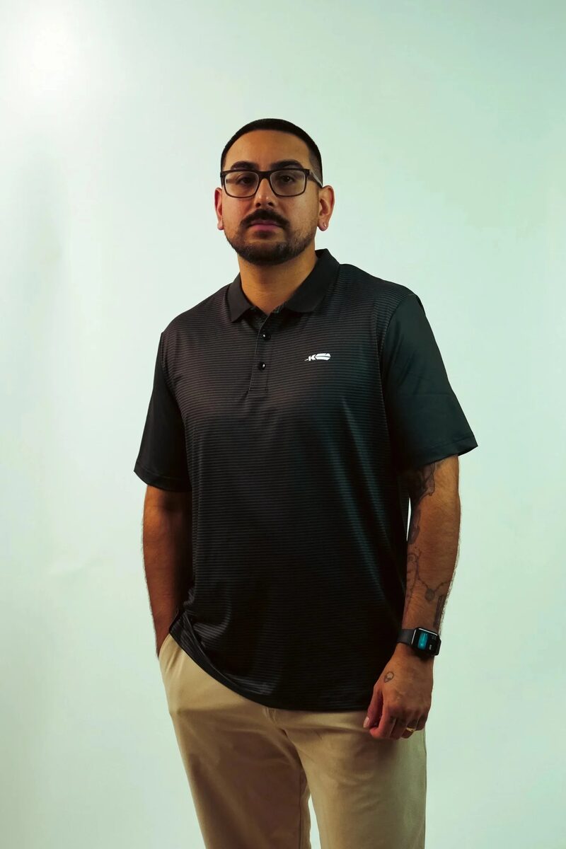 Kingfisher Golf Black Striped Polo — on model