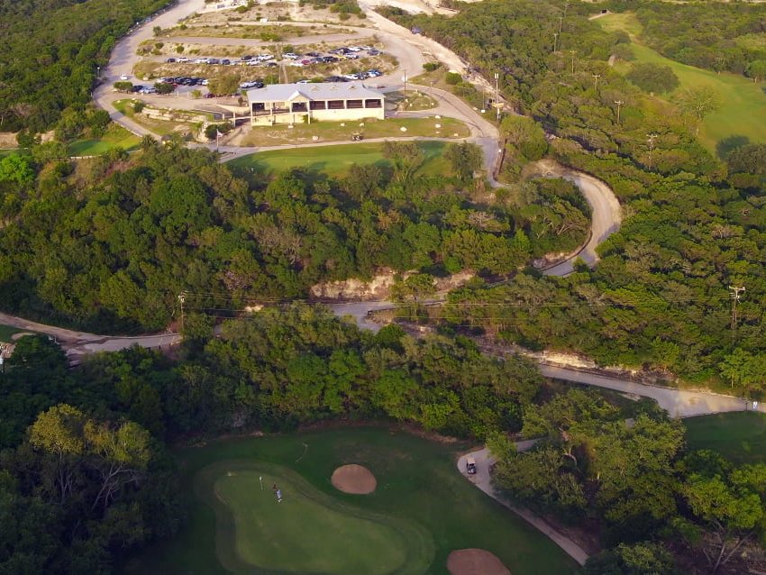 Aerial view of Cedar Creek Golf Course rolling through Hill Country on the northwest side of San Antonio