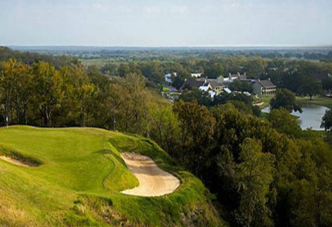 Lush resort fairway winding through Texas landscape at Wolfdancer Golf Club