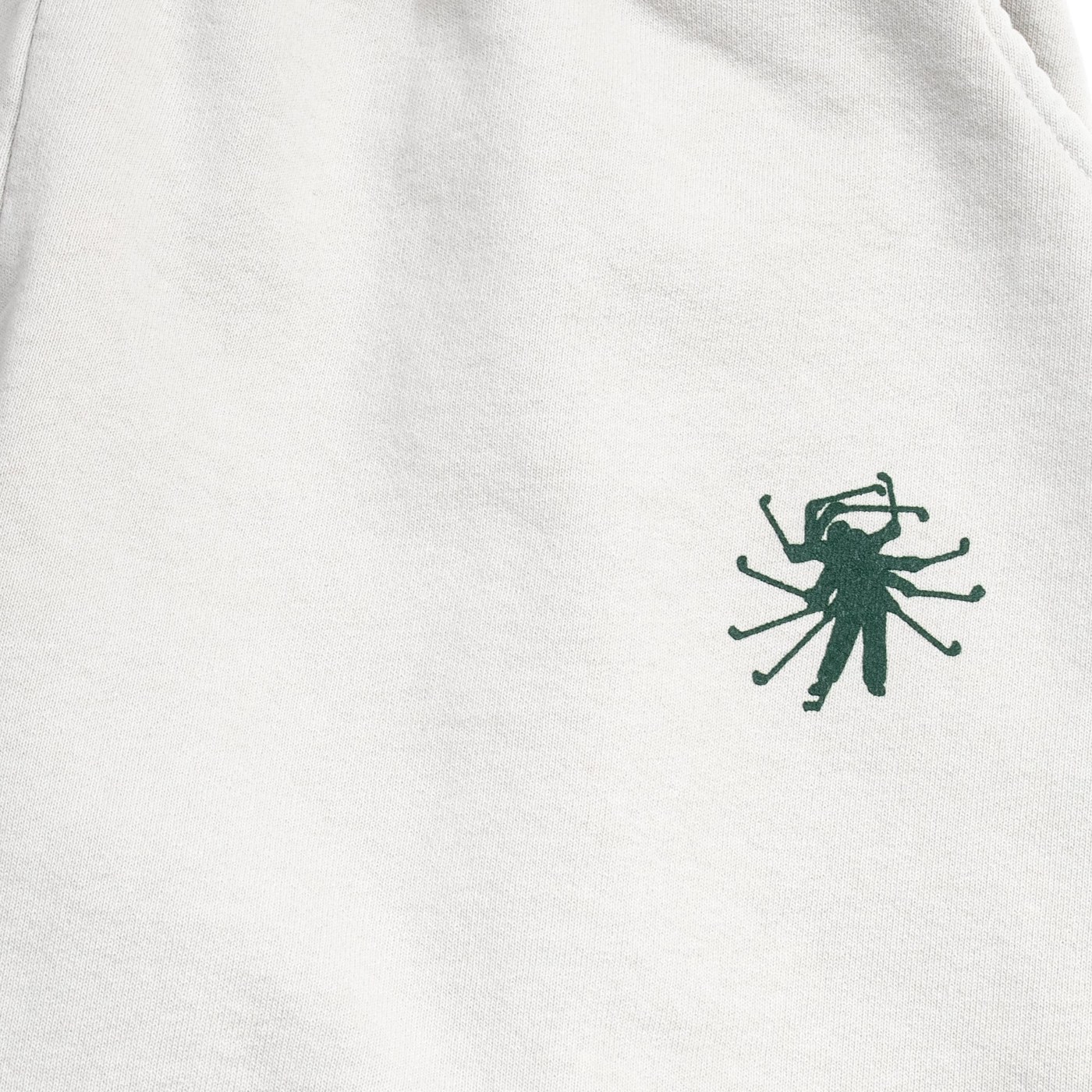 The wordmark is embroidered at the hip of the classic logo sweat pant