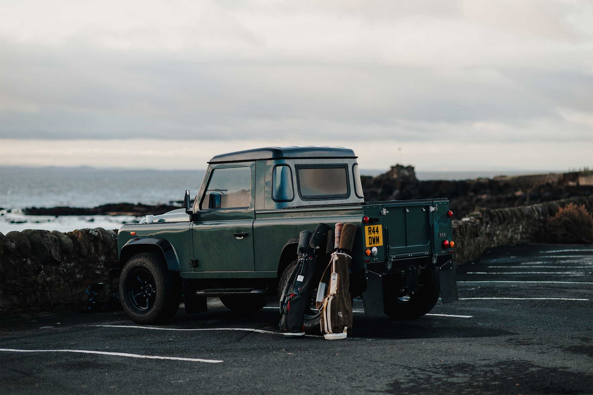 A Land Rover Defender loaded with bags at Anstruther