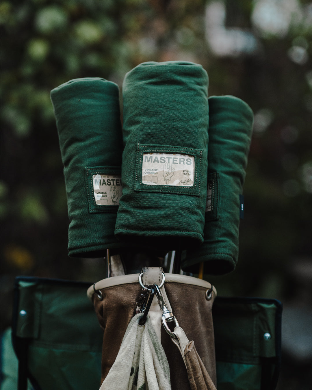 A Vintage Chubbs x Fyfe Golf headcover made from reworked dark green canvas