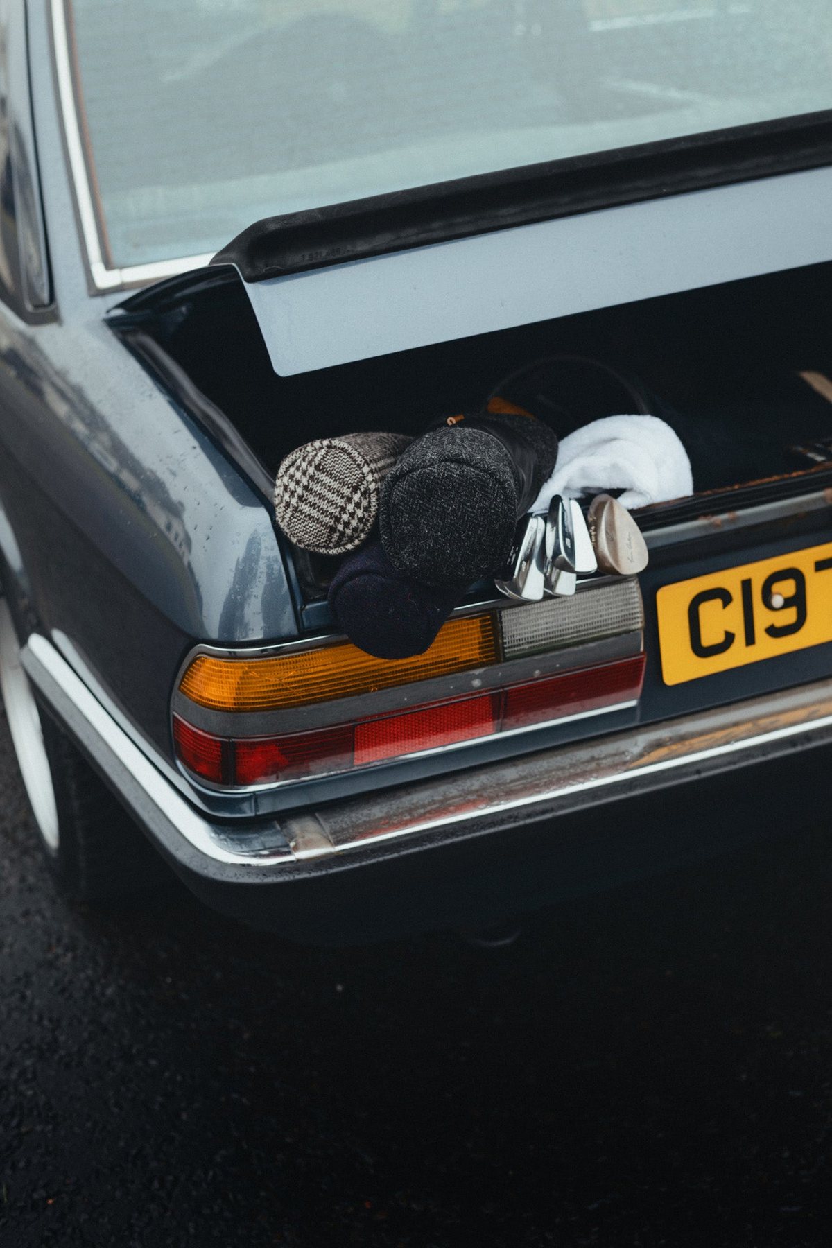 The open boot with headcovers inside