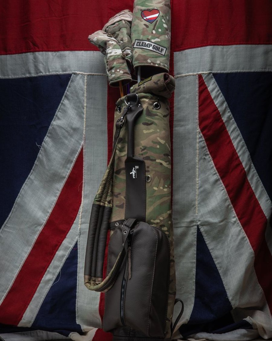 A camo Clamp Golf Company bag against a Union Jack