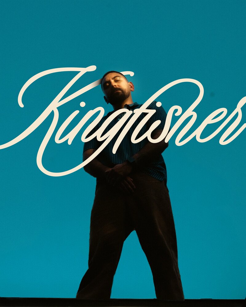 The Kingfisher script over a campaign portrait