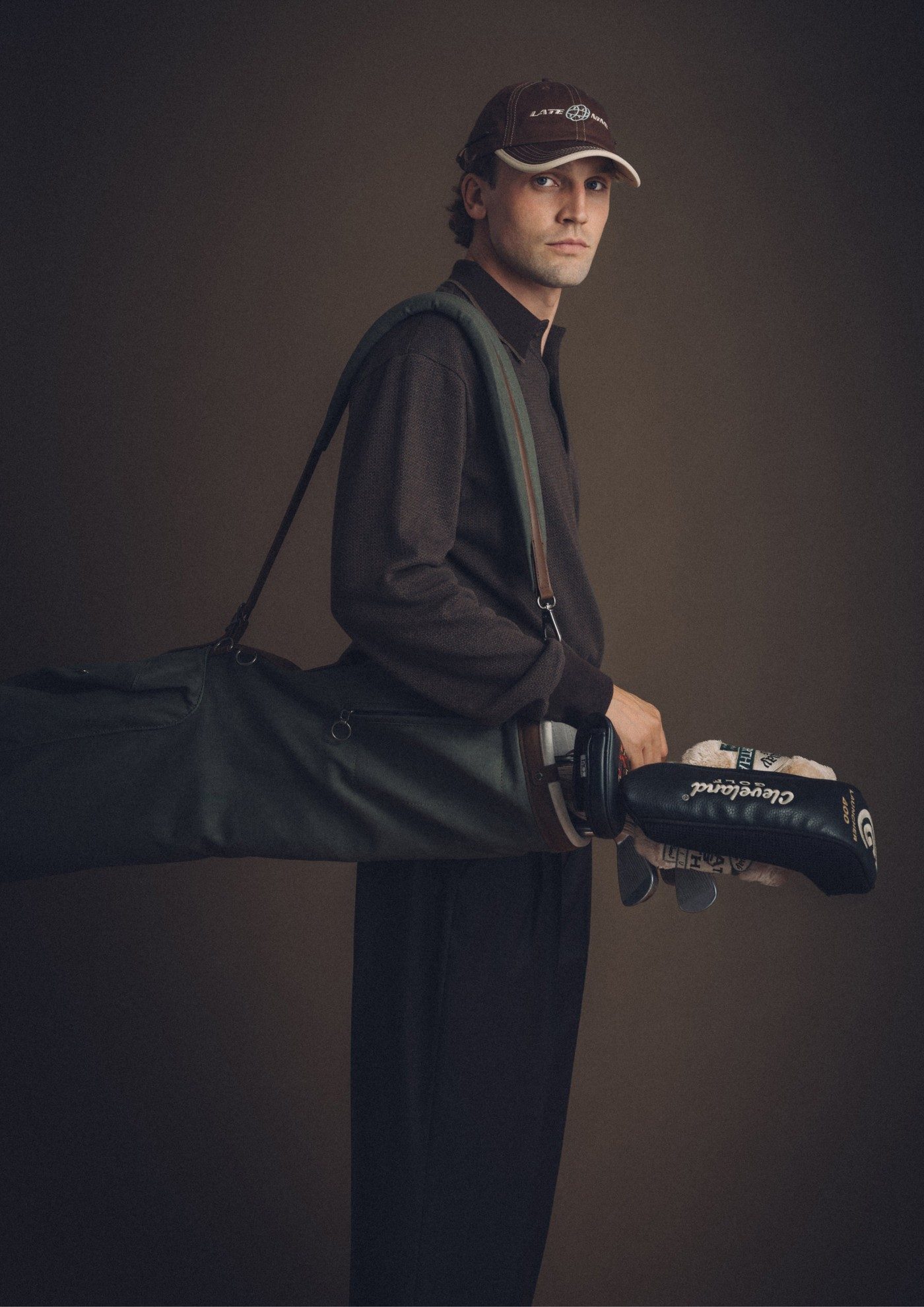Late Nine &mdash; the FW26 lookbook: Orbit Cap, knit polo, pleated slacks and a travel cover