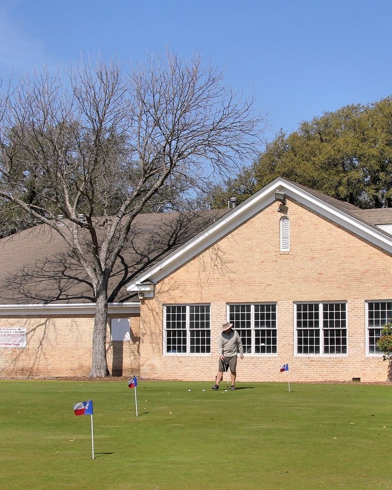 The Lions Municipal clubhouse behind the practice green
