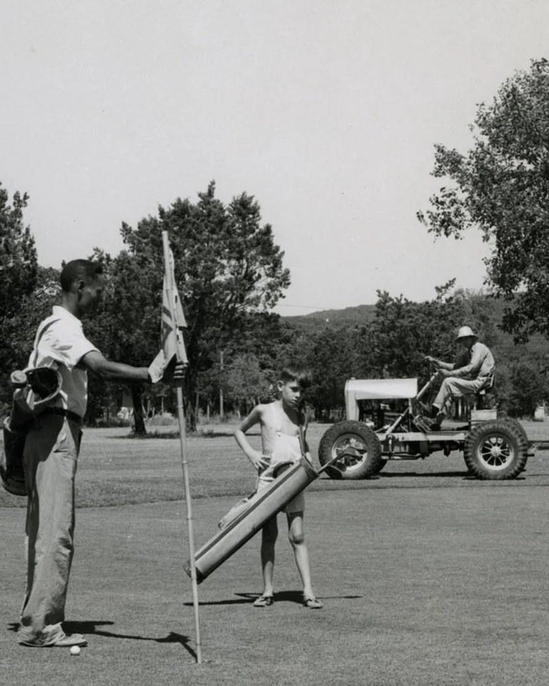 Golfers on the fairway at Lions Municipal in the early years, black and white archival photo