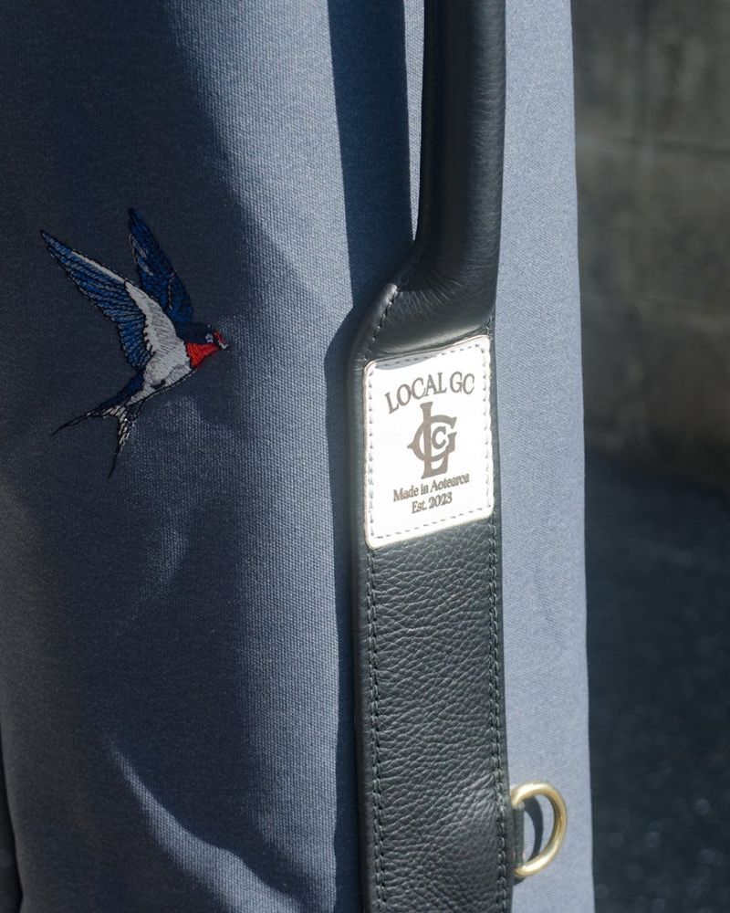The swallow embroidery and tag on the Daybreak Sunday bag