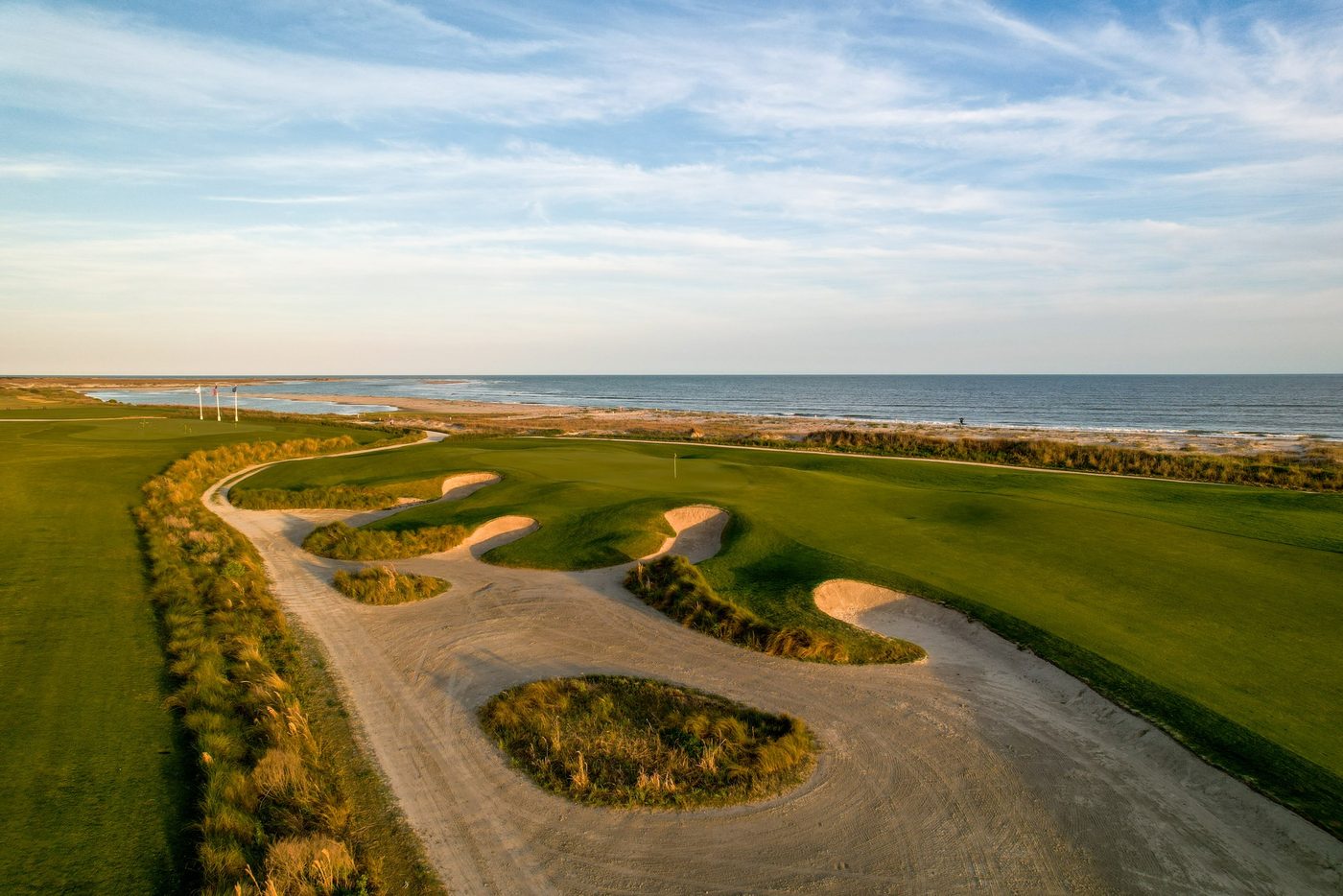 Low aerial over the sandy waste area short of Kiawah's 18th green