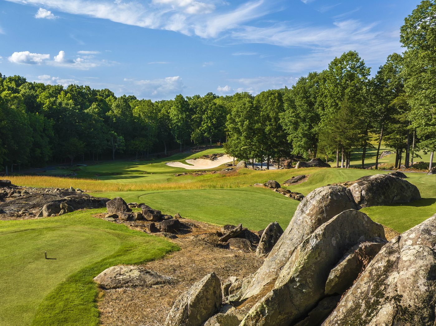 Tot Hill Farm's 2nd hole seen past a cluster of huge granite boulders