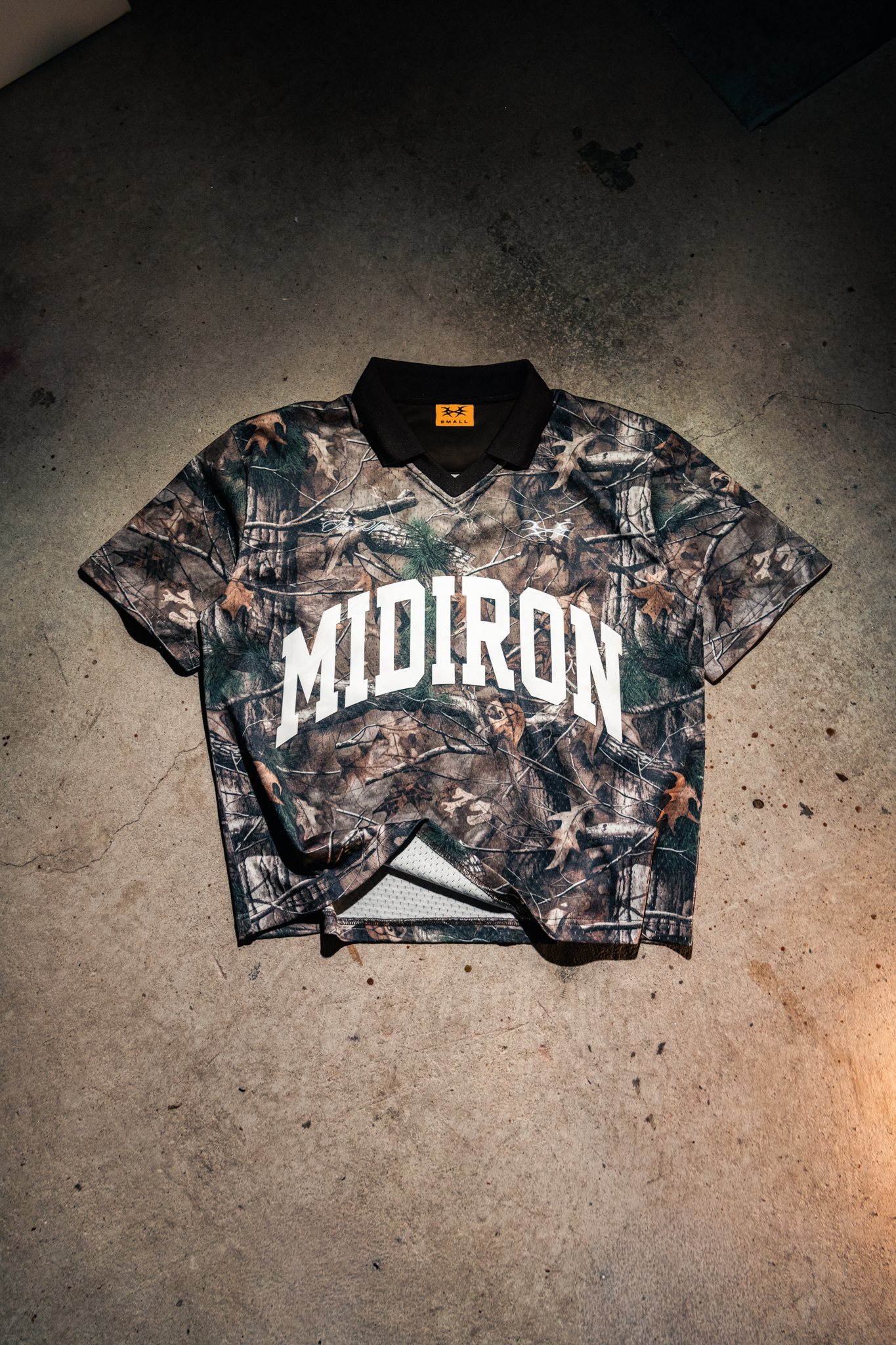 Midiron Tour Spec Polo in tree camo, perforated polyester with arched MIDIRON chest print
