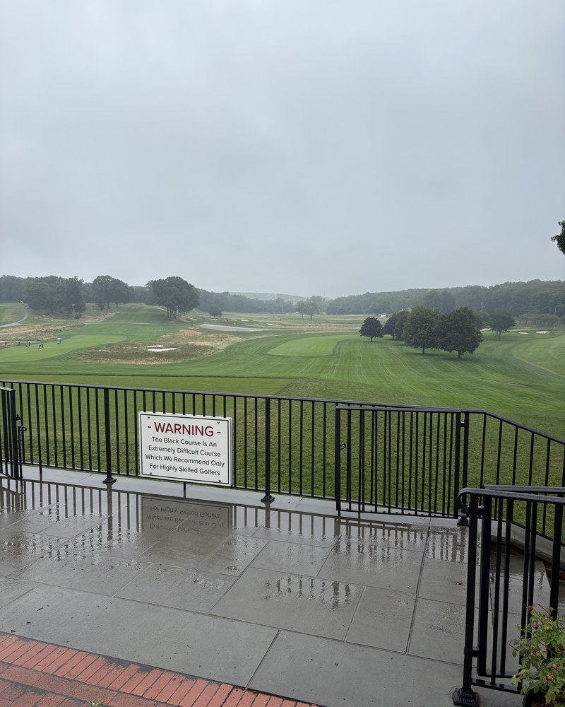 The warning sign by the first tee at Bethpage Black