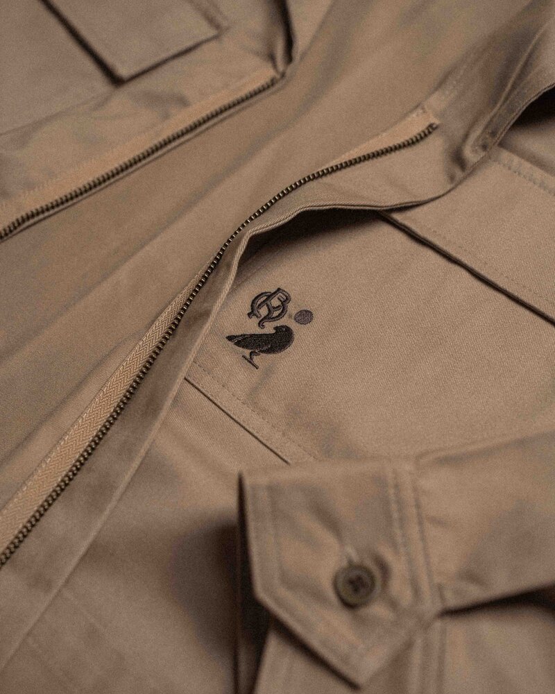 Odd Ritual Caddie Jacket in Khaki with back print, on model · view 3 of 4