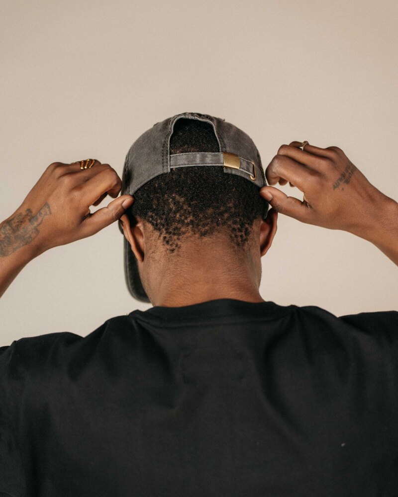 Odd Ritual Script Dad Cap in Charcoal, on model · view 4 of 4