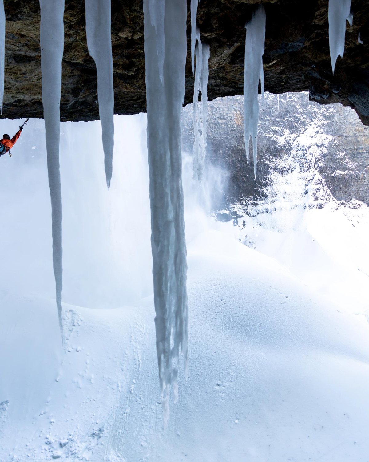 An ice climber on frozen falls at Helmcken Falls, British Columbia