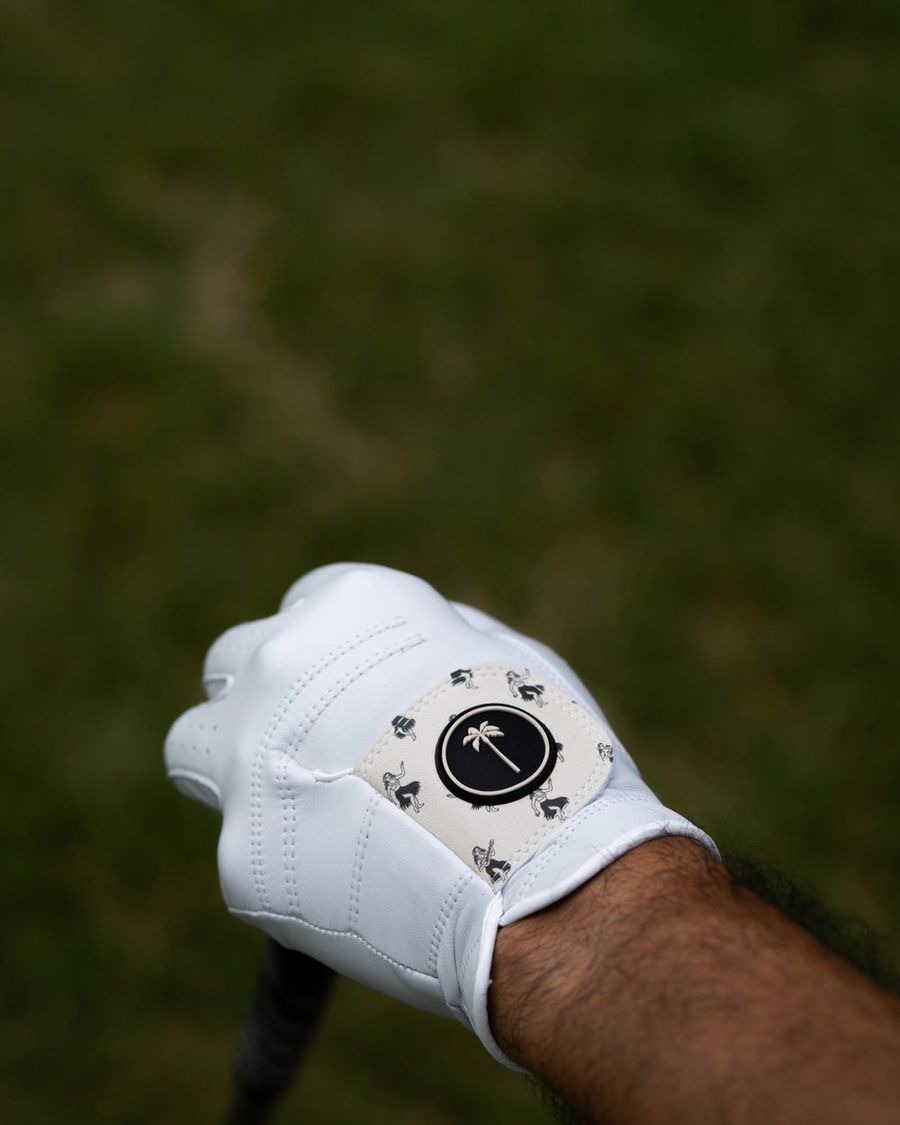 A Palm Hula glove gripping a club
