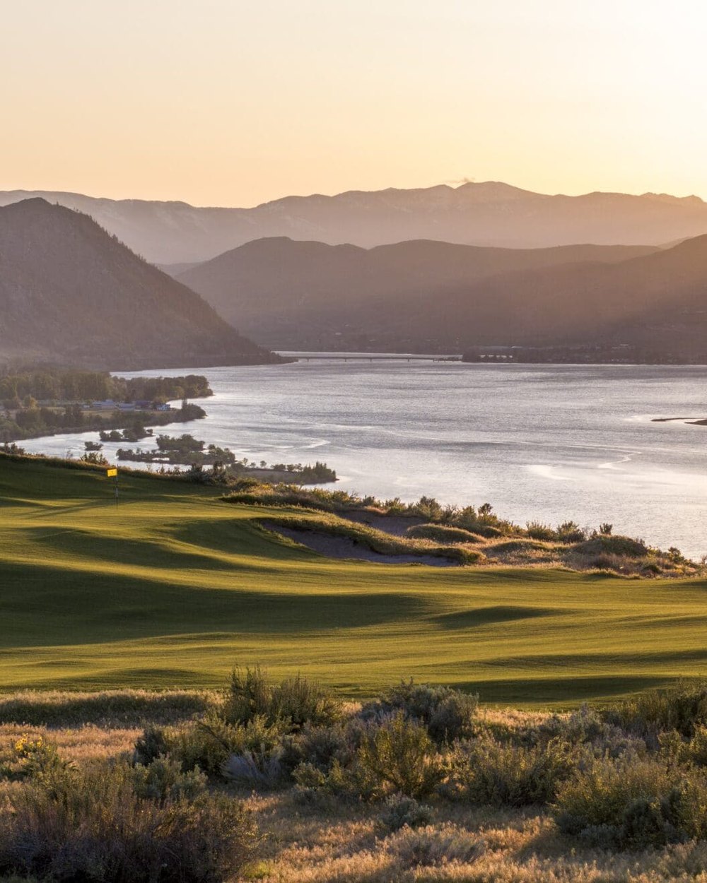 Scarecrow at sunset above a bend in the Columbia River
