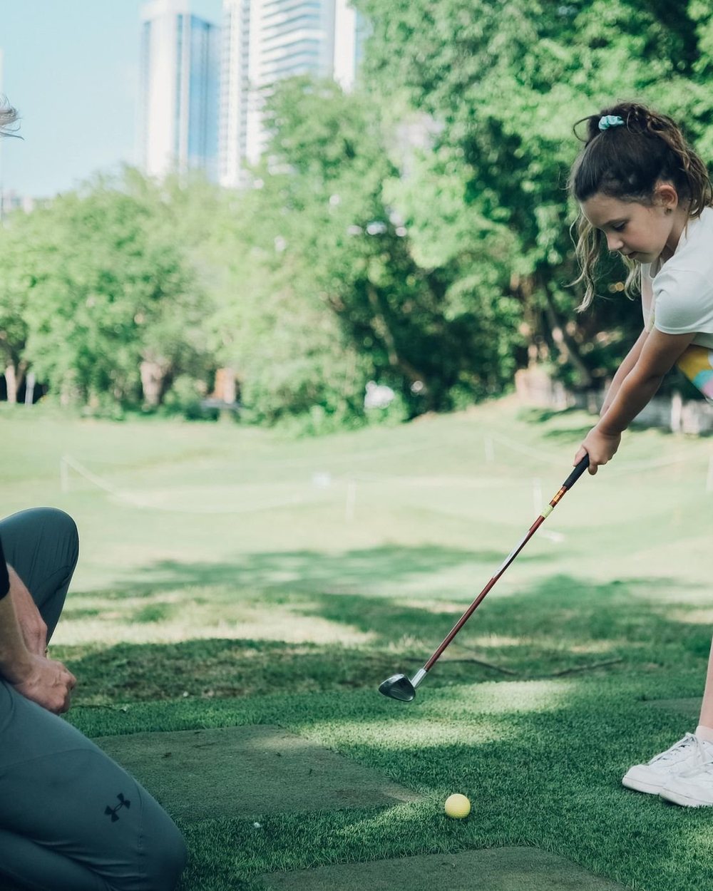 A golfer chipping at Butler Pitch & Putt