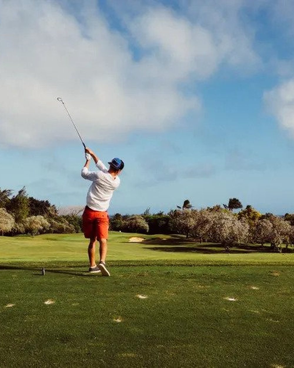 A golfer on the Toptracer range at Dripping Springs Country Club