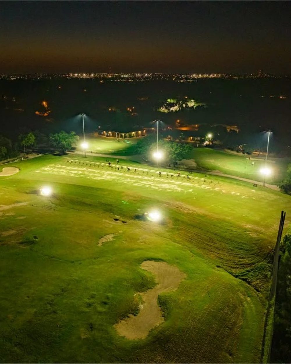 Forest Creek's range lit at night, seen from above
