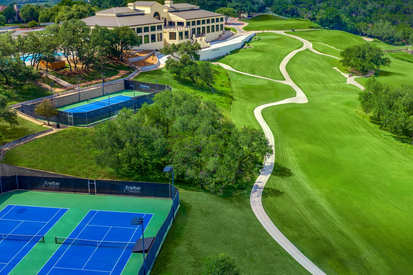 River Place Country Club golf course in Northwest Hills, Texas — Tom Kite and Roy Bechtol, early 1990s