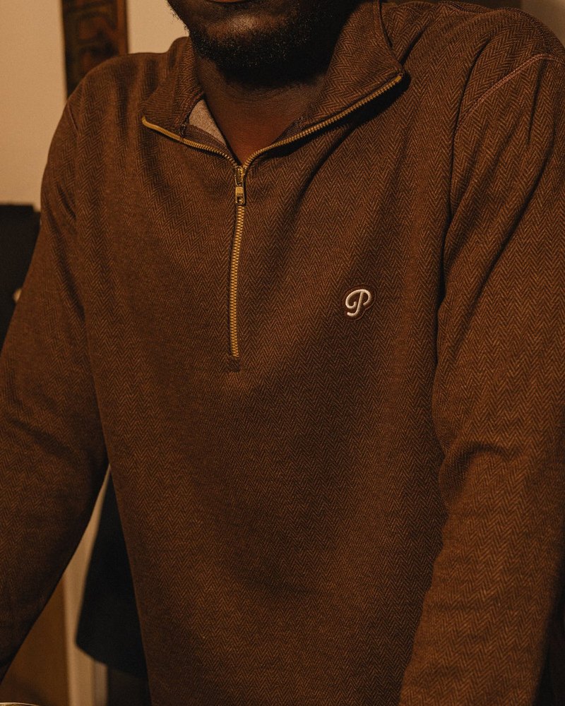 Public Drip Herringbone Half Zip in coffee, on model