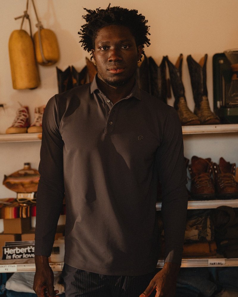 Public Drip Triborough Waffle Knit Polo in dark slate, on model