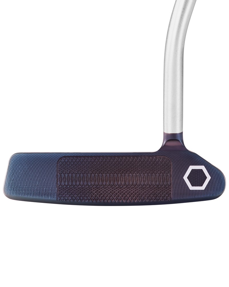 The Bettinardi BB28 Armlock blade at address with the flame-toned finish visible