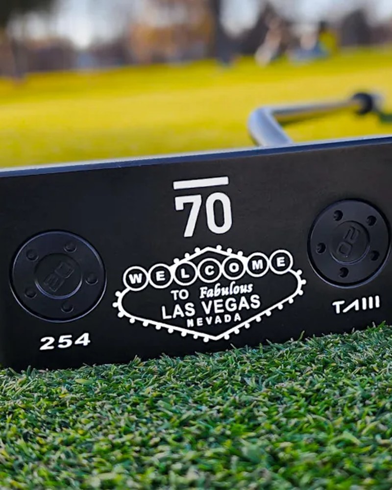 The laser etched Las Vegas sign and 254 on the sole of the Sub 70 TAIII wide blade
