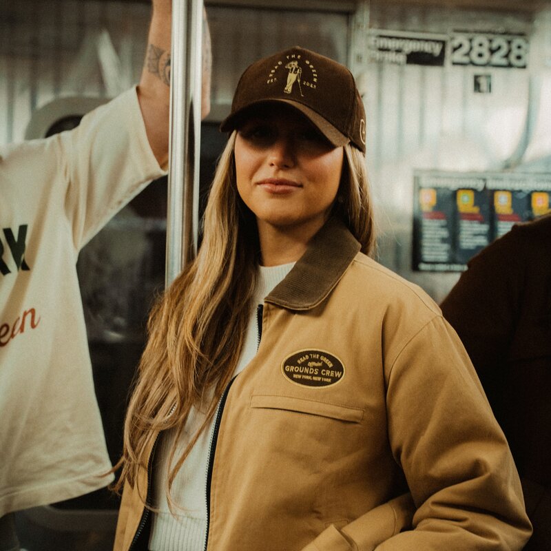 Grounds Crew Jacket and Espresso Founder's Cap on the 1 train — @readthegreen_