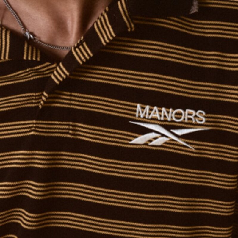 Espresso striped GOAT Pique Polo collar detail
