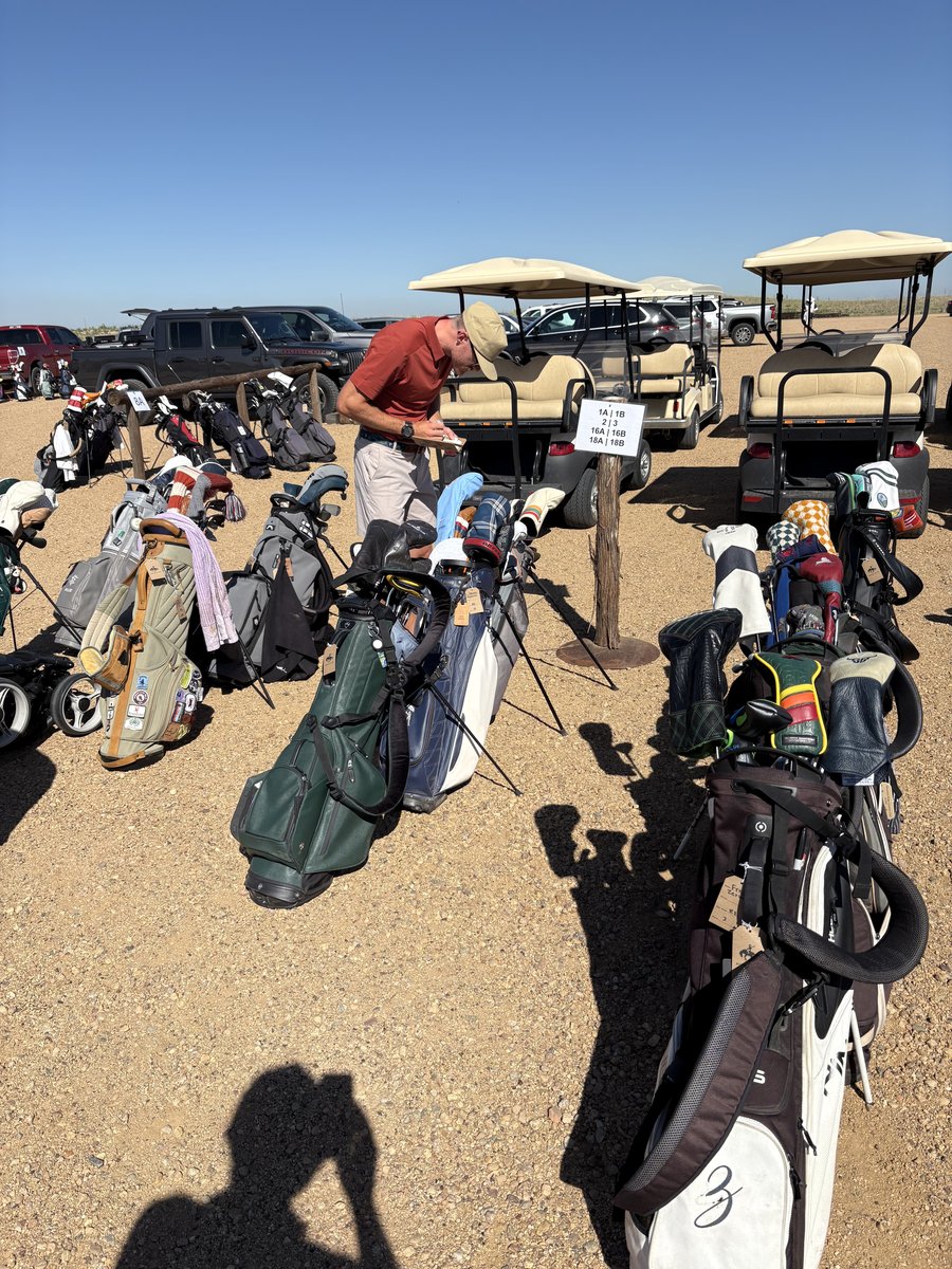 72 golf bags staged at the Rodeo Dunes bag drop before The Great Divide event &mdash; Random Golf Club