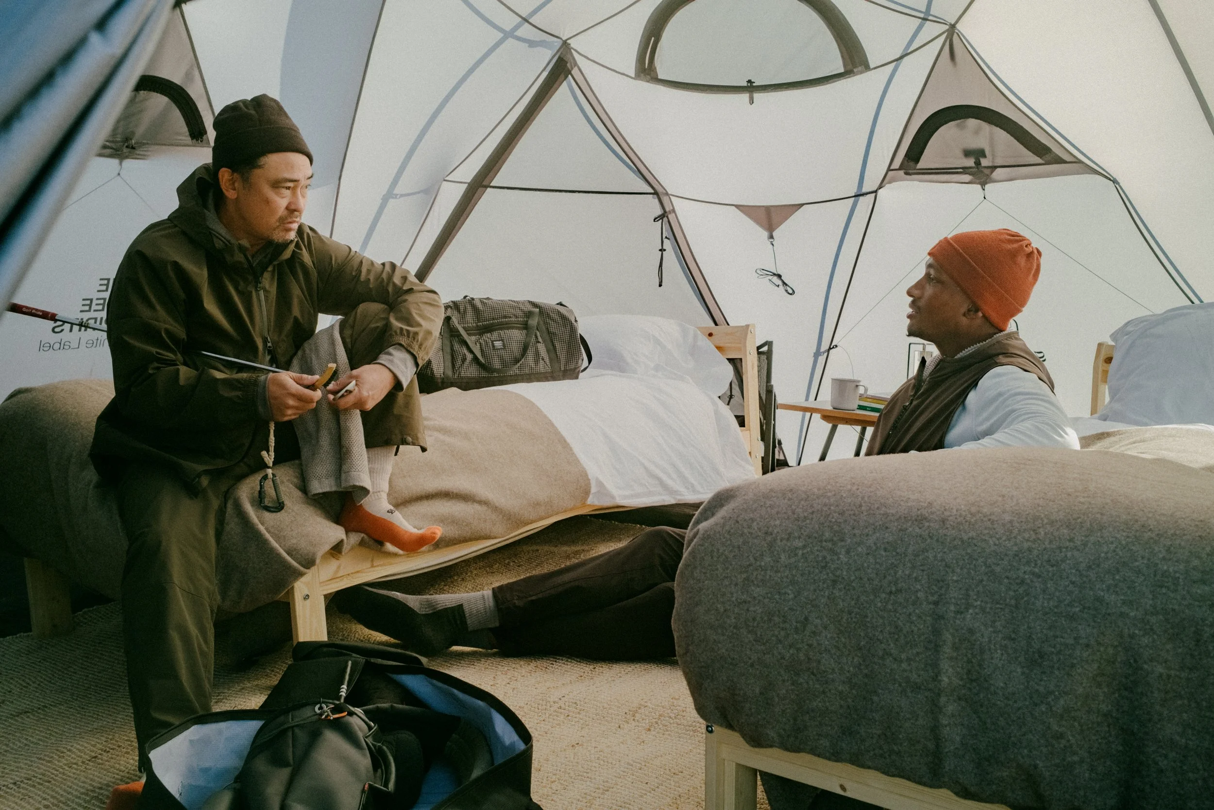 Morning inside the Basecamp dome, two cots and a wool blanket